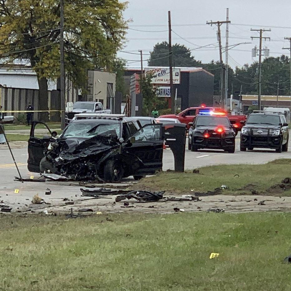 Detroit-area police officer charged with manslaughter in crash that killed 2 men